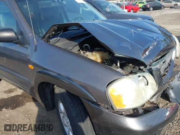 2004 Mazda Tribute LX with VIN 4F2CZ941X4KM19302, listed as a IAAI auction lot 41791389 with 123,036 mi miles. Bid and sale history available at carsss.com. Image 12.
