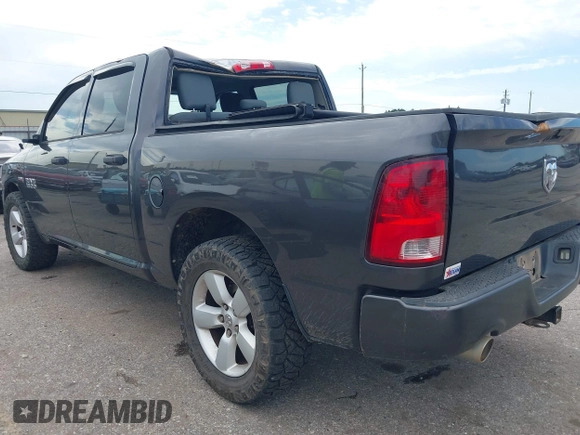 2014 Ram 1500 Express with VIN 1C6RR6KTXES272212, listed as a IAAI auction lot 42452271 with 140,854 mi miles and . Bid and sale history available at DreamBid. Image 3.
