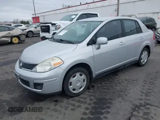 2007 Nissan Versa 1.8 SL with VIN 3N1BC11E97L447829, listed as a IAAI auction lot 41612386 with 123,500 mi miles. Bid and sale history available at carsss.com. Image 17.