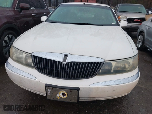 2001 Lincoln Continental with VIN 1LNHM97V51Y670610, listed as a IAAI auction lot 41439804 with 160,114 mi miles and . Bid and sale history available at DreamBid. Image 6.