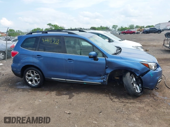 2017 Subaru Forester Touring with VIN JF2SJAWC7HH455648, listed as a IAAI auction lot 42118358 with 58,123 mi miles and . Bid and sale history available at DreamBid. Image 14.