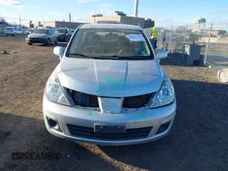 2012 Nissan Versa S with VIN 3N1BC1CP2CK213563, listed as a IAAI auction lot 41339306 with 61,581 mi miles. Bid and sale history available at carsss.com. Image 6.
