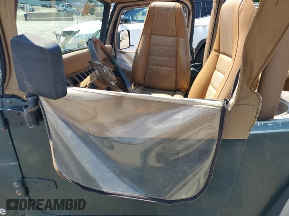 1994 Jeep Wrangler с VIN 1J4FY29S4RP467813, выставлен на аукционе Copart как лот 62484855 с пробегом 213 872 миль миль и Чистый • Clean title. История ставок и продаж доступна на DreamBid. Изображение 7.