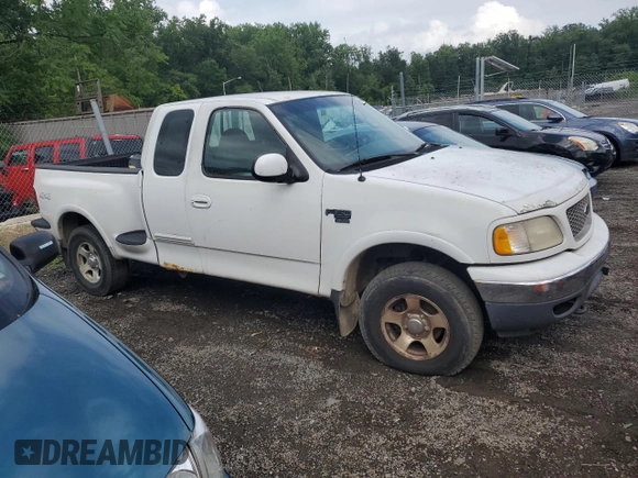 2000 Ford F-150 with VIN 2FTRX08W3YCA36619, listed as a Copart auction lot 62683885 with Not provided miles and Salvage title. Bid and sale history available at DreamBid. Image 4.