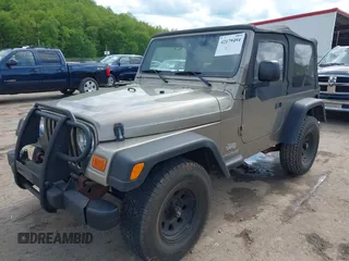 2003 Jeep Wrangler SE with VIN 1J4FA29193P302424, listed as a IAAI auction lot 42179494 with 120,712 mi miles and . Bid and sale history available at DreamBid. Image 2.