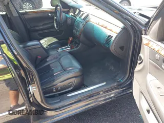 2011 Cadillac DTS Premium Collection z VIN 1G6KH5E65BU140314, wystawiony jako IAAI lot #42050040 z przebiegiem 149 921 mil mil oraz . Historia ofert i sprzedaży dostępna na DreamBid. Obrazek 5.