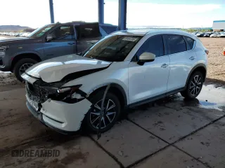 2018 Mazda CX-5 Touring z VIN JM3KFACM6J1475716, wystawiony jako Copart lot #59466705 z przebiegiem 33 433 mil mil oraz Szkoda całkowita • Salvage title. Historia ofert i sprzedaży dostępna na DreamBid. Obrazek 1.