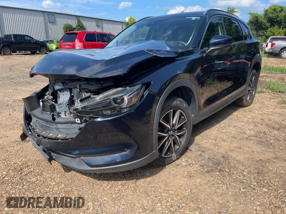 2018 Mazda CX-5 Grand Touring with VIN JM3KFBDMXJ1391984, listed as a Copart auction lot 65138665 with 97,244 mi miles and Clean title. Bid and sale history available at DreamBid. Image 2.