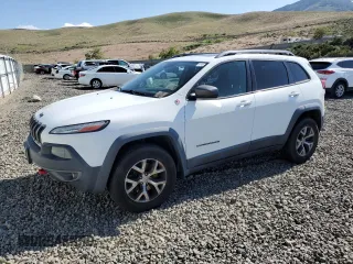 2015 Jeep Cherokee Trailhawk z VIN 1C4PJMBS9FW521838, wystawiony jako Copart lot #58596625 z przebiegiem 147 372 mil mil oraz Czysty tytuł • Clean title. Historia ofert i sprzedaży dostępna na DreamBid. Obrazek 1.