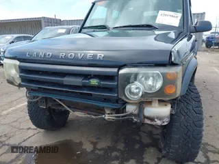 2004 Land Rover Discovery SE with VIN SALTW19464A860565, listed as a IAAI auction lot 42019860 with 153,274 mi miles. Bid and sale history available at carsss.com. Image 6.