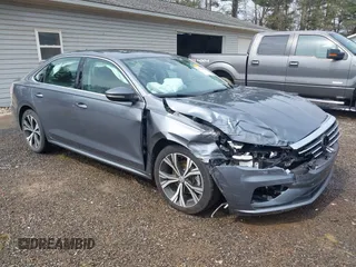 2021 Volkswagen Passat 2.0T SE with VIN 1VWSA7A3XMC011113, listed as a IAAI auction lot 41942881 with 63,753 mi miles. Bid and sale history available at carsss.com. Image 1.