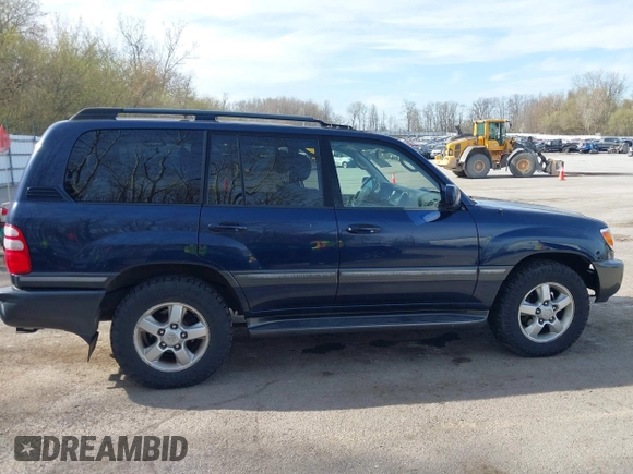 2004 Toyota Land Cruiser with VIN JTEHT05J942054673, listed as a IAAI auction lot 42112791 with 206,784 mi miles. Bid and sale history available at carsss.com. Image 13.