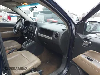 2014 Jeep Compass High Altitude with VIN 1C4NJCEA8ED522686, listed as a IAAI auction lot 41611351 with 220,145 mi miles and . Bid and sale history available at DreamBid. Image 5.