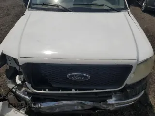 2005 Ford F-150 XL with VIN 1FTVF12585NA40842, listed as a Copart auction lot 61728465 with 288,002 mi miles and Salvage title. Bid and sale history available at DreamBid. Image 11.