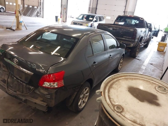 2010 Toyota Yaris with VIN JTDBT4K33A1354492, listed as a IAAI auction lot 40736581 with 228,018 mi miles. Bid and sale history available at carsss.com. Image 4.
