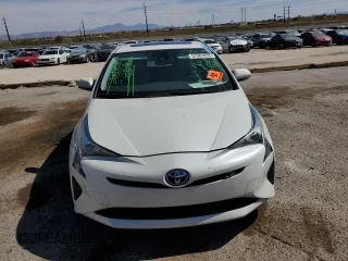 2018 Toyota Prius Two z VIN JTDKARFU0J3054693, wystawiony jako Copart lot #57581855 z przebiegiem 51 684 mil mil oraz Szkoda całkowita • Salvage title. Historia ofert i sprzedaży dostępna na DreamBid. Obrazek 5.