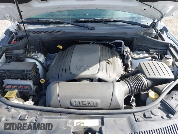 2013 Dodge Durango Crew with VIN 1C4SDHDT2DC679600, listed as a IAAI auction lot 42215737 with 128,499 mi miles and . Bid and sale history available at DreamBid. Image 10.