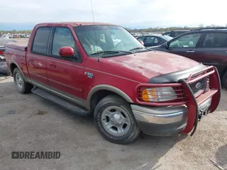 2002 Ford F-150 XLT with VIN 1FTRW07L02KB41132, listed as a IAAI auction lot 41879827 with 140,091 mi miles. Bid and sale history available at carsss.com. Image 1.