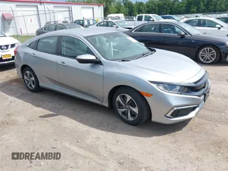 2020 Honda Civic LX with VIN 2HGFC2F66LH559532, listed as a IAAI auction lot 42667815 with 26,847 mi miles and . Bid and sale history available at DreamBid. Image 1.