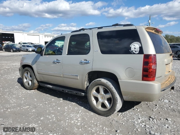 2011 Chevrolet Tahoe LTZ with VIN 1GNSCCE0XBR172570, listed as a Copart auction lot 80959144 with 246,436 mi miles and Salvage Title. Bid and sale history available at carsss.com. Image 2.