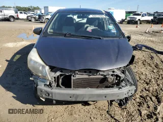 2012 Toyota Yaris L z VIN JTDKTUD35CD505783, wystawiony jako Copart lot #42017425 z przebiegiem 182 875 mil mil oraz Szkoda całkowita • Salvage title. Historia ofert i sprzedaży dostępna na DreamBid. Obrazek 5.