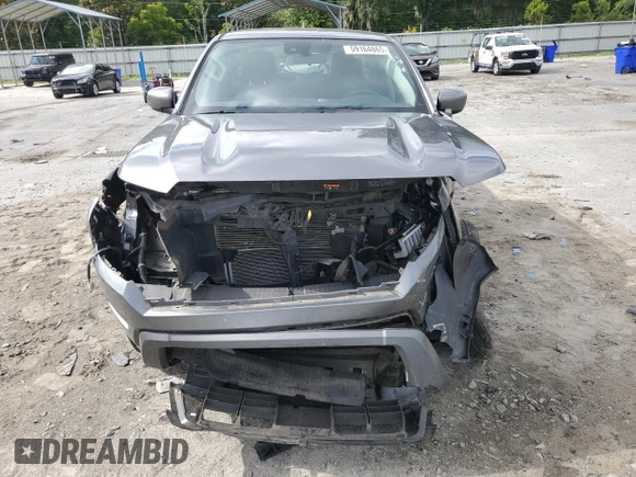 2022 Nissan Frontier SV with VIN 1N6ED1EK8NN680666, listed as a Copart auction lot 59164865 with 57,697 mi miles and Salvage title. Bid and sale history available at DreamBid. Image 5.
