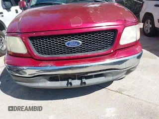 2002 Ford F-150 XL with VIN 1FTRX17W02KB40270, listed as a IAAI auction lot 42573017 with Not provided miles and . Bid and sale history available at DreamBid. Image 6.