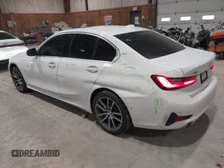 2020 BMW 3 Series 330i xDrive with VIN 3MW5R7J06L8B17690, listed as a IAAI auction lot 41659559 with 74,357 mi miles. Bid and sale history available at carsss.com. Image 3.