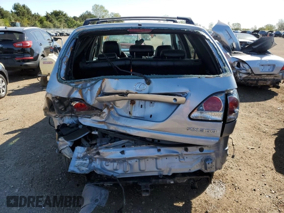 2002 Lexus RX 300 with VIN JTJHF10UX20277815, listed as a Copart auction lot 73397284 with 214,627 mi miles and Salvage Title. Bid and sale history available at carsss.com. Image 6.