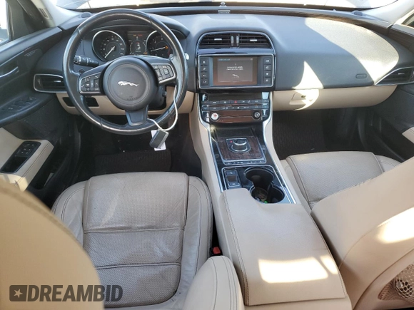 2017 Jaguar XE with VIN SAJAE4BN6HA972747, listed as a Copart auction lot 85415574 with 80,870 mi miles and Salvage Title. Bid and sale history available at DreamBid. Image 8.