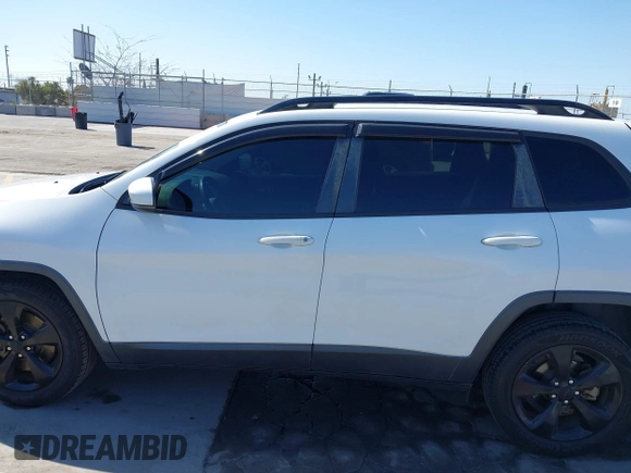 2016 Jeep Cherokee 75th Anniversary with VIN 1C4PJLCB9GW107422, listed as a IAAI auction lot 41997941 with 121,641 mi miles and . Bid and sale history available at DreamBid. Image 14.