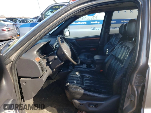 1999 Jeep Grand Cherokee Limited with VIN 1J4GW68N8XC770353, listed as a Copart auction lot 74670614 with Not provided miles and Non repairable. Bid and sale history available at DreamBid. Image 7.
