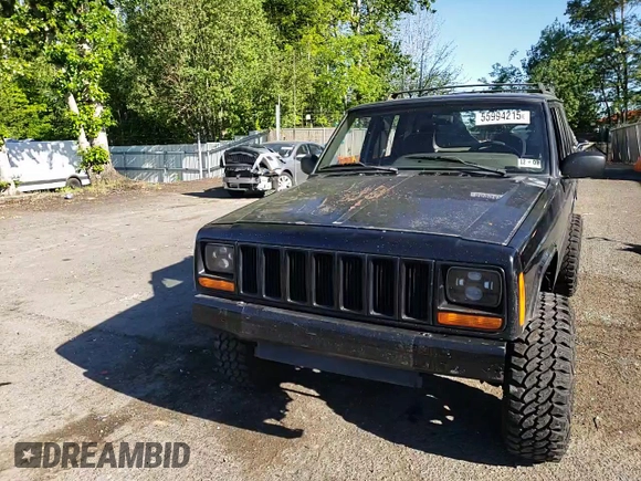 2000 Jeep Cherokee z VIN 1J4FF48S3YL180200, wystawiony jako Copart lot #55994215 z przebiegiem 209 182 mil mil oraz Szkoda całkowita • Salvage title. Historia ofert i sprzedaży dostępna na DreamBid. Obrazek 14.