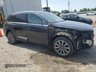 2017 Audi Q7 Premium Plus with VIN WA1LAAF7XHD033350, listed as a Copart auction lot 54946615 with 136,934 mi miles and Salvage Title. Bid and sale history available at DreamBid. Image 4.