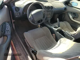 1998 Pontiac Firebird Firebird z VIN 2G2FS22K6W2202173, wystawiony jako Copart lot #77708594 z przebiegiem Nie podano mil oraz Czysty tytuł • Clean title. Historia ofert i sprzedaży dostępna na DreamBid. Obrazek 8.