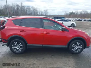2016 Toyota RAV4 LE with VIN JTMBFREV2GJ097058, listed as a IAAI auction lot 41720372 with 118,606 mi miles. Bid and sale history available at carsss.com. Image 14.