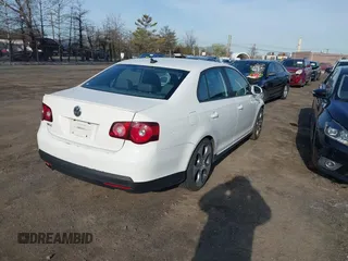 2009 Volkswagen Jetta GLI with VIN 3VWFJ71K89M073155, listed as a IAAI auction lot 41949089 with 138,772 mi miles and . Bid and sale history available at DreamBid. Image 4.