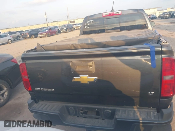 2016 Chevrolet Colorado 2WD LT z VIN 1GCGSCE37G1374901, wystawiony jako IAAI lot #41463562 z przebiegiem 163 716 mil mil oraz . Historia ofert i sprzedaży dostępna na DreamBid. Obrazek 16.