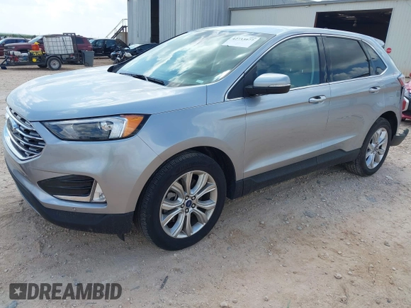 2022 Ford Edge Titanium with VIN 2FMPK4K99NBB06136, listed as a IAAI auction lot 42733977 with 57,794 mi miles and . Bid and sale history available at DreamBid. Image 17.