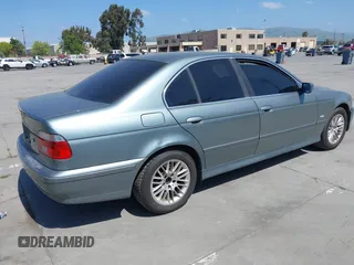 2003 BMW 5 Series 530iA with VIN WBADT63413CK33315, listed as a IAAI auction lot 42064612 with 205,426 mi miles. Bid and sale history available at carsss.com. Image 4.