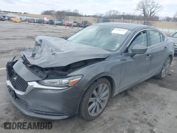 2020 Mazda 6 Grand Touring with VIN JM1GL1TY6L1525169, listed as a IAAI auction lot 41683512 with 73,313 mi miles and . Bid and sale history available at DreamBid. Image 17.