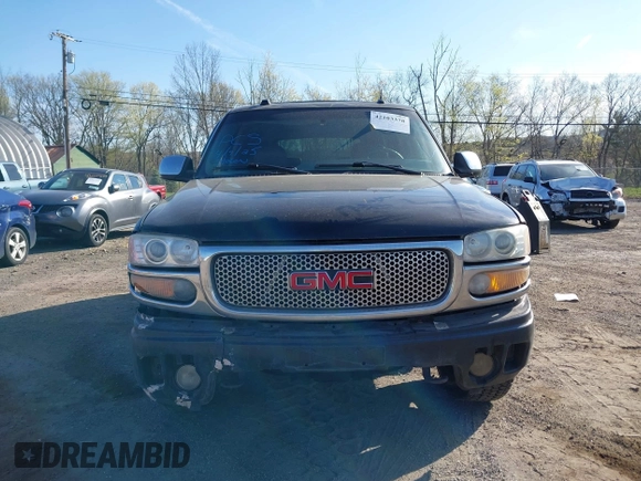 2005 GMC Yukon Denali z VIN 1GKEK63U55J254214, wystawiony jako IAAI lot #42103378 z przebiegiem 131 183 mil mil oraz . Historia ofert i sprzedaży dostępna na DreamBid. Obrazek 11.