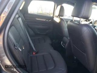 2023 Mazda CX-5 Signature with VIN JM3KFBXY8P0258573, listed as a Copart auction lot 42615075 with 18,916 mi miles and Salvage Title. Bid and sale history available at carsss.com. Image 10.