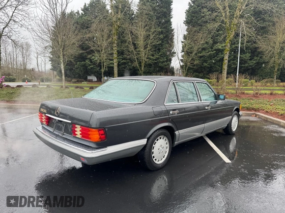 1988 Mercedes-Benz 560 with VIN WDBCA39D1JA406073, listed as a Copart auction lot 50398345 with 111,524 mi miles and Clean Title. Bid and sale history available at DreamBid. Image 4.