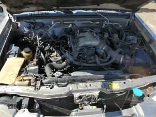 2004 Nissan Frontier XE with VIN 1N6ED29X24C436064, listed as a Copart auction lot 58916434 with 277,026 mi miles and Salvage title. Bid and sale history available at DreamBid. Image 11.