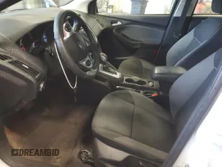 2014 Ford Focus SE with VIN 1FADP3F25EL449810, listed as a Copart auction lot 73174364 with 140,031 mi miles and Salvage Title. Bid and sale history available at DreamBid. Image 7.