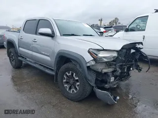 2016 Toyota Tacoma SR with VIN 3TMCZ5ANXGM010164, listed as a IAAI auction lot 41802736 with 201,697 mi miles. Bid and sale history available at carsss.com. Image 1.