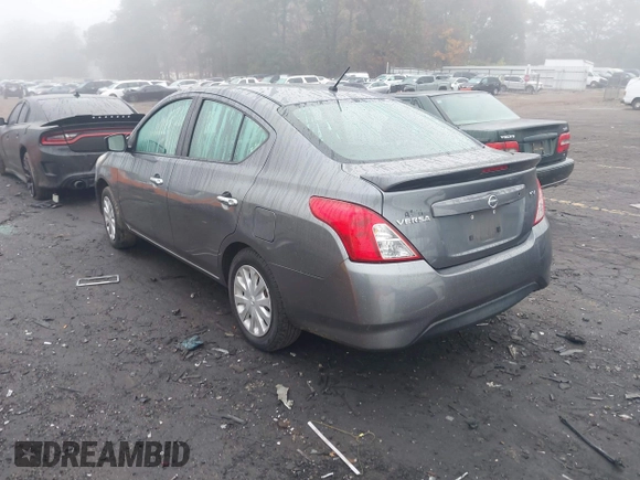 2018 Nissan Versa SV with VIN 3N1CN7AP8JL801740, listed as a IAAI auction lot 40832043 with 171,497 mi miles. Bid and sale history available at carsss.com. Image 3.