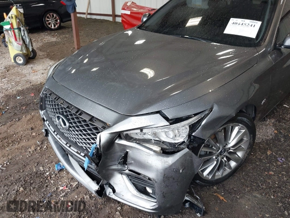 2019 Infiniti Q50 3.0t Signature Edition with VIN JN1EV7APXKM519048, listed as a IAAI auction lot 40445241 with 99,705 mi miles. Bid and sale history available at carsss.com. Image 6.