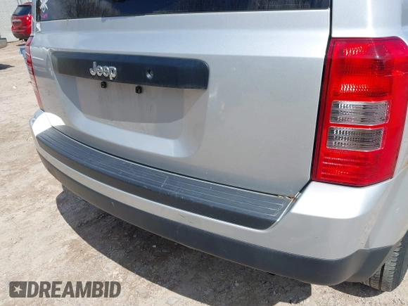 2013 Jeep Patriot Sport with VIN 1C4NJPBAXDD254864, listed as a IAAI auction lot 42019511 with 139,994 mi miles. Bid and sale history available at carsss.com. Image 6.